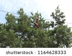 Shoes On A High Voltage Line 