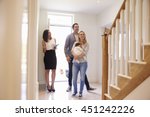 Realtor Showing Young Family...