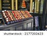 Small photo of Paris, France, June 2022. Odette patisserie in the Latin quarter of Notre-Dame. Featuring a vintage and colorful look, it has all the Parisian charm. Close up shot on the pastries in the shop window.
