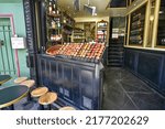 Small photo of Paris, France, June 2022. Odette patisserie in the Latin quarter of Notre-Dame. Featuring a vintage and colorful look, it has all the Parisian charm. Entrance with sweets in the window.