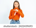 Small photo of Young beautiful woman standing over white studio background being upset showing a timeout gesture, needs stop, asks time for rest after hard work