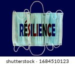 Protection masks with the word resilience in French on blue blackground. Motivational message in french. Resilience. Quote in french. 