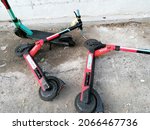 Small photo of Rome, Italy - October 29, 2021, scooters abandoned on the street in an uncivilized way.