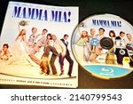 Small photo of Rome, Italy - March 28, 2022, detail of the cover and Blu Ray disc of the film Mamma Mia!