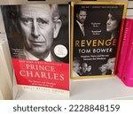 Small photo of Rome, Italy - November 16, 2022, detail of the covers of the books Prince Charles: The Passions and Paradoxes of an Improbable Life and Revenge: Meghan, Harry and the war between the Windsors.
