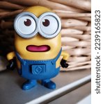 Small photo of Rome, Italy - December 16, 2022, detail of a small Minion model, taken from the movie Minions is a 2015 animated film directed by Pierre Coffin and Kyle Balda.