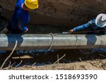 Small photo of Construction site of pipeline.Holiday test or a Continuity test is one of the non destructive test method applied on protective coatings to detect unacceptable discontinuities such as pinholes & voids