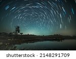 Circular star trails over the lake. Astro photography and Nightscape photography at Mandan Lake, Rajpipla, Gujarat