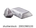 Small photo of Isolated zinc ingot or bar next to raw zinc nugget on isolated white background, metal used in alloy and steel production.