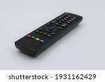 Digital tv remote control on white background.