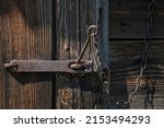 Old Wooden Door Closed With An...
