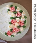 White cake decorated with...