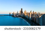 Small photo of aerial drone view of Chicago metropolis from the lake during high noon. the beautiful skyscraper showcases of the wonders of the city architecture. related to business finance and travel