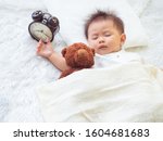Baby Kid Are Sleeping On The...