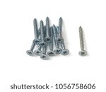 Small photo of Wire products, galvanized screws on isolated white background