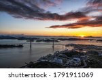 Sunset view of Mokpo bridge and the port taken from Yudalsan mountain top in Mokpo, South Korea.