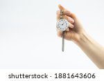 Small photo of Vintage watch in the girl's hand. The concept of a bygone time.