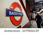 Small photo of London, England, UK - October 21st 2023: Baker Street Transport for London roundel sign on tube platform