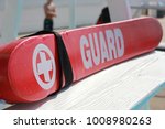 Lifeguard rescue tube on pool...