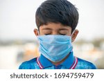 Small photo of Bhopal Madhya Pradesh India 20-march-2020 Darsh Malviya in protective Disposable Mask