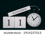 Important date and event on a black and white calendar. Cube date and month, day 11 November. Autumn season.