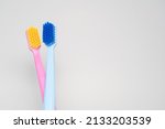 Small photo of A conceptual of a couple toothbrush in love. Toothbrushes convey the human relationship between a man and a woman.