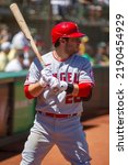 Small photo of Oakland, California - August 10, 2022: Los Angeles Angels infielder David Fletcher in the on deck circle during a game against the Oakland Athletics at the Oakland Coliseum.