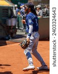 Small photo of Oakland, California - August 21, 2022: Seattle Mariners shortstop J.P. Crawford on the field before a game against against the Oakland Athletics at the Oakland Coliseum.