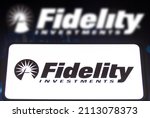 Small photo of January 27, 2022, Brazil. In this photo illustration a Fidelity Investments logo seen displayed on a smartphone screen and in the background