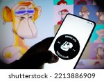 Small photo of October 15, 2022, Brazil. In this photo illustration, the Bored Ape Yacht Club logo seen displayed on a smartphone