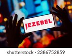 Small photo of November 10, 2023, Brazil. In this photo illustration, the Jezebel logo is displayed on a smartphone screen