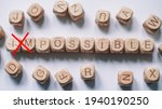 impossible word concept. wooden ... | Shutterstock . vector #1940190250