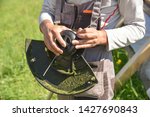 trimmer close up mow the grass... | Shutterstock . vector #1427690843