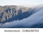 Small photo of Cliffs of Chapin and sea of clouds descending the slope. The Nublo Rural Park. Gran Canaria. Canary Islands. Spain.