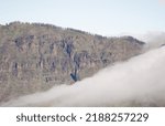 Small photo of Sea of clouds descending the slope of The Chapin Cliffs. The Nublo Rural Park. Gran Canaria. Canary Islands. Spain.