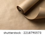 Craft paper roll on paper background with copy space