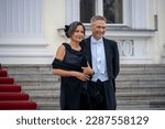 Small photo of Berlin, Germany - Marcj 29, 2023: close up portrait of the CEO of Rolls Royce Germany Dirk Geisinger with Gesine Eisfeld in front of Bellevue Palace