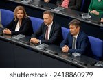 Small photo of Berlin, Germany - March 30, 2023: Federal Minister of the Interior Nancy Faeser, Minister of Finance Christian Lindner, Vice-Chancellor and Minister of Economic Affairs Robert Habeck in the Bundestag