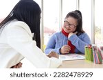 Small photo of Disabled kids classroom, children have study fun at school, kids learning and playing together, schoolgirl has fun with teacher in classroom, kid education with physical disability and intellectual.