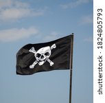 Pirate flag against the blue...