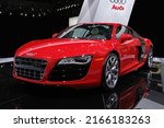 Small photo of Detroit, Michigan USA - January 20 2009: A red Audi R8 sports car on display at the 2009 North American International Auto Show (NAIAS).