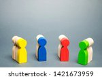 Small photo of Groups of multicolored wooden people. The concept of market segmentation. Customer relationship management. Target audience, customer care. Groups of buyers. Targeting. Segments