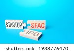 Small photo of Puzzles symbolize entry of a business startup to the stock exchange through a simplified listing procedure SPAC (Special purpose acquisition company). Merger bypassing stock exchange IPO.