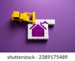 Small photo of Removing the roof of a house. Concept. The bulldozer is about to demolish the house. Encroachment on private property. Illegal buildings construction. Renewal and restoration of residential areas.