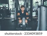 Small photo of Men are exercising happily on bicycle machine in the fitness gym to exercise with the concept of strengthening the body for lasting and disease-free health and a hansom body and slim