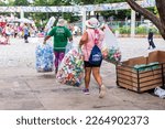 Small photo of Belo Horizonte - Minas Gerais - Brasil - FEV 18 2023: Waste collectors at the street carnival in BH