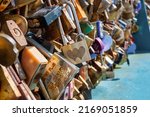 Small photo of Bakewell, UK- May 15, 2022: The thousands of pad locks on the Bakewell Love Locks Bridge.