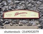 Small photo of Bakewell, UK- May 15, 2022: The sign for Bloomers Bakery in Bakewell