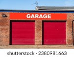 Closed Garage doors with text Garage above 