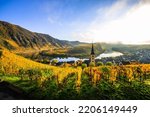 Small photo of The Moselle loop in autumn, a beautiful river in Germany, makes a 180 degree loop. with vineyards and a great landscape and lighting in the morning, golden autumn